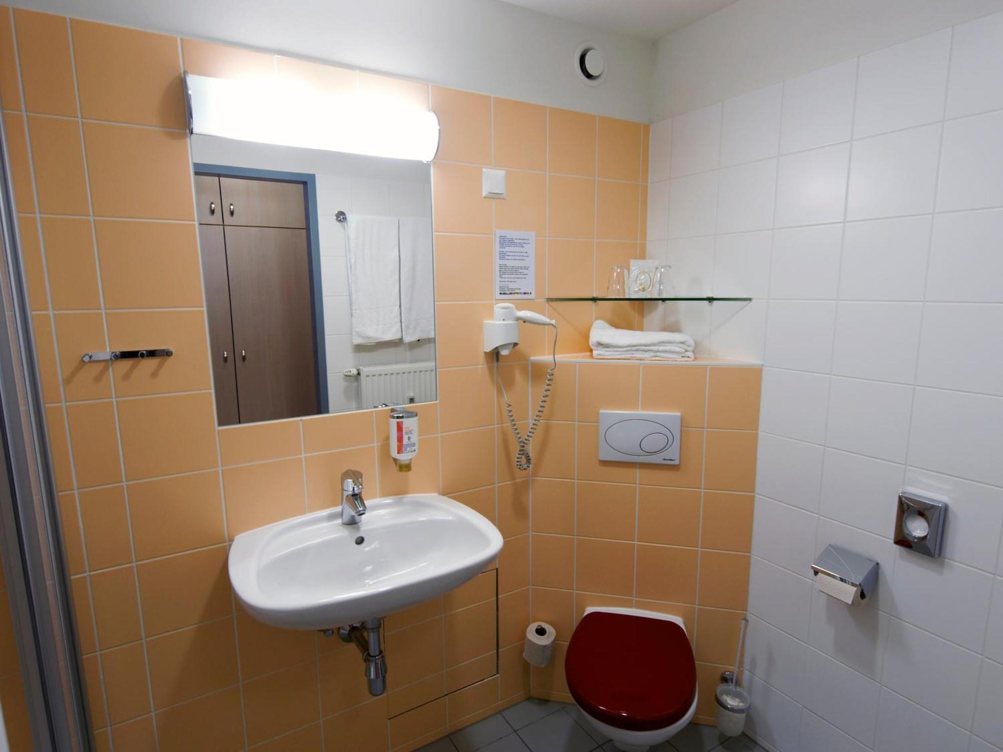 Deluxe Einzelzimmer mit Blick auf den Innenhof